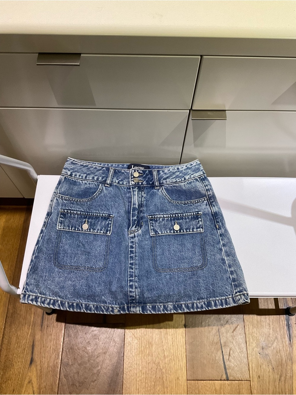 Plastic Island Blue Washed Denim Mini Skirt with Front Patch Pockets